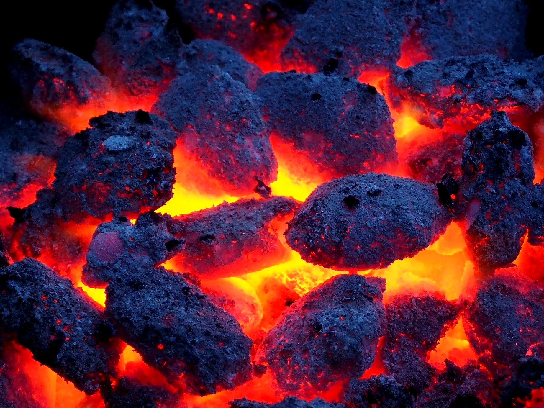 Flame in the Charcoals